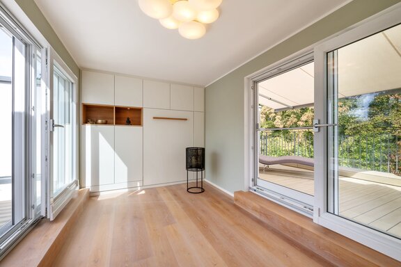 Room with two rooftop terraces