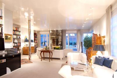 Exklusives Penthouse über zwei Ebenen mit offenem Kamin und Wintergarten