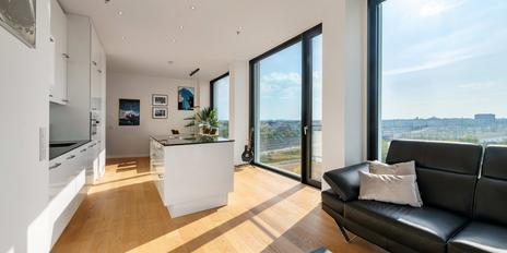 Exklusives Stadtdomizil mit Panoramablick bis zu den Alpen und Rooftop-Nutzung im Friends Tower 2