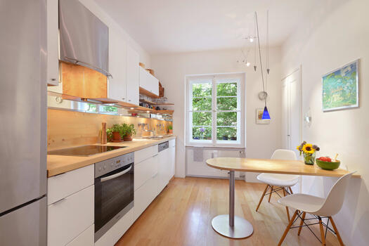 Kitchen with green courtyard view