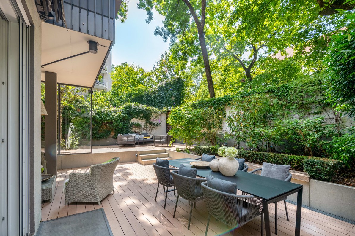 Outdoor seating with lounge area and garden