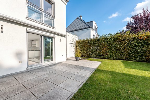 South-facing terrace in the garden with protected view