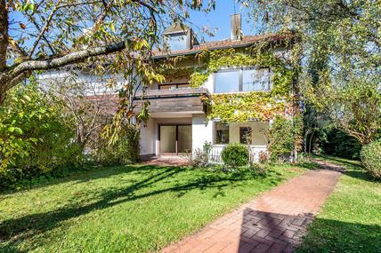 Familienfreundliches Einfamilienhaus mit großem Raumangebot und zauberhaftem Garten