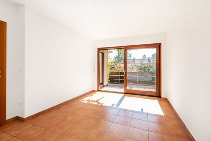 Bedroom with covered south facing balcony