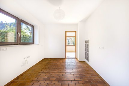 Bright kitchen with access to the dining area