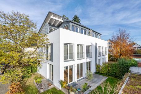 Family-friendly, currently rented semi-detached house with timeless modern aesthetics and solar thermal energy