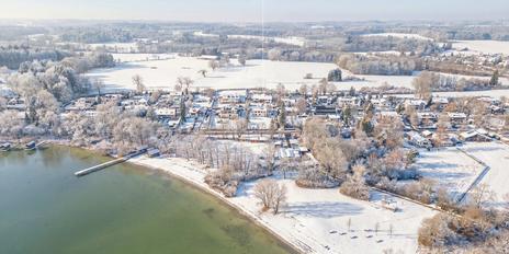 Familienvilla mit Pool, luftigem Strandhausflair, Seeblick, Lift und Einliegerwohnung in Seenähe