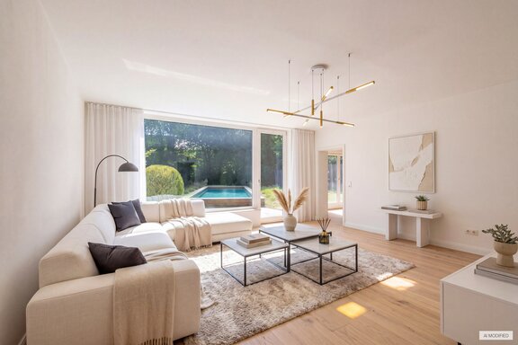 Living area opening onto the garden (rendered)