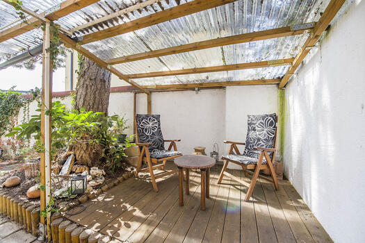 Bright and covered outdoor seating area