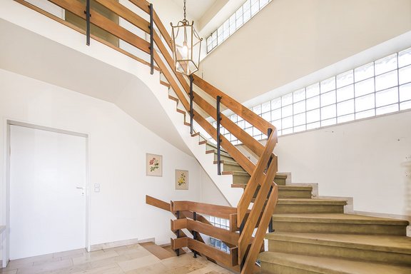 Light filled hallway with double height ceiling