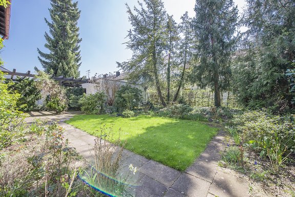 Sunny garden with outdoor seating