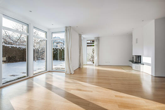 Spacious living/dining area with a fireplace