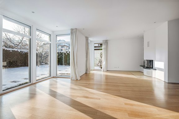 Spacious living/dining area with a fireplace
