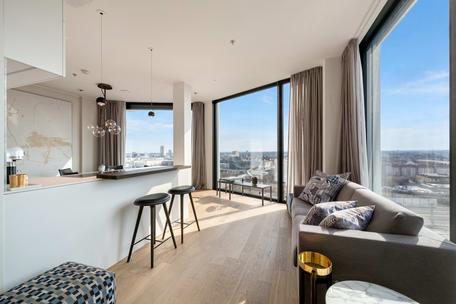 Friends Tower: A breathtaking urban residence featuring exclusive amenities and panoramic Alpine views