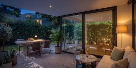 A Garden Idyll in the Prime Location of Herzogpark: Exclusive 3.5-room apartment in a modern designer villa