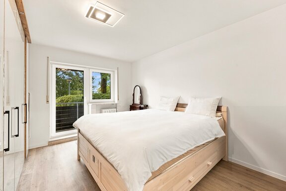 Schlafzimmer mit Balkonzugang