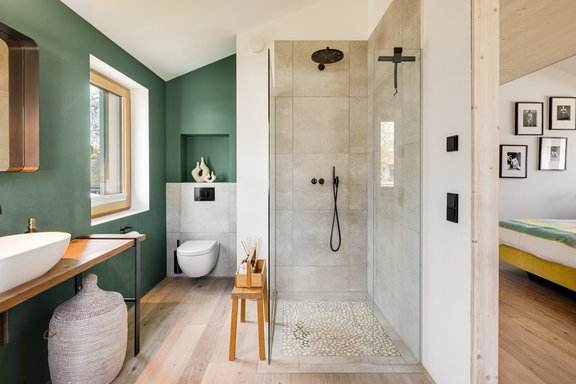 Master bathroom with hardwood floors