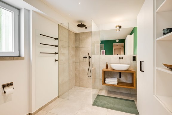 Spacious bathroom with shower on the lower level