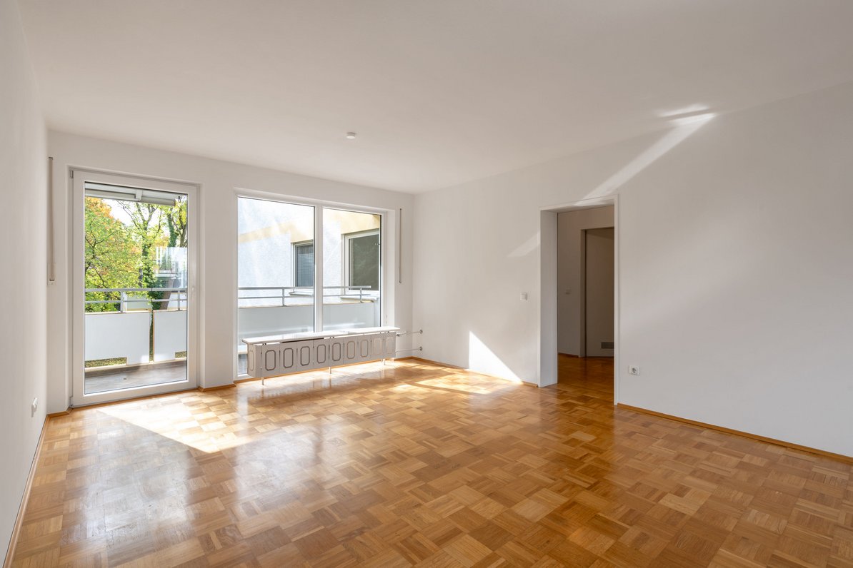 Spacious living room with balcony access