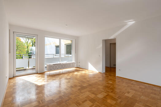 Spacious living room with balcony access