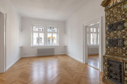Dining room with decorative tiled stove