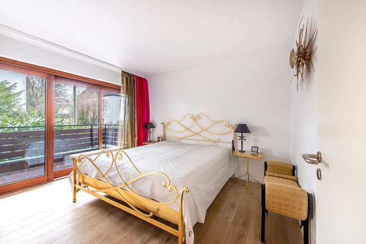 Schlafzimmer mit Balkon