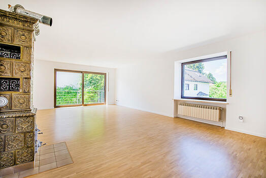 Living area on the upper floor with balcony access