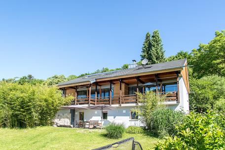 Großzügiges Einfamilienhaus mit offenem Kamin, Südgarten und traumhaftem See- und Alpenblick