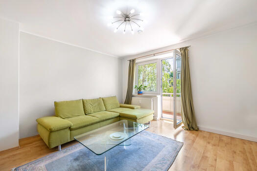 Living area with west-facing balcony