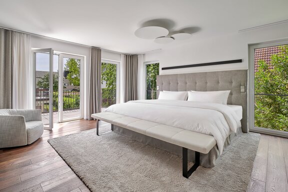 Master bedroom with a terrace