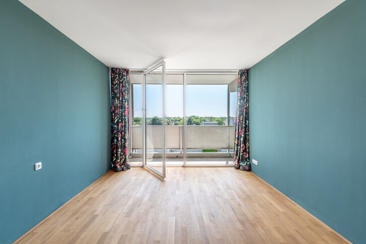 Schlafzimmer mit Balkonzugang