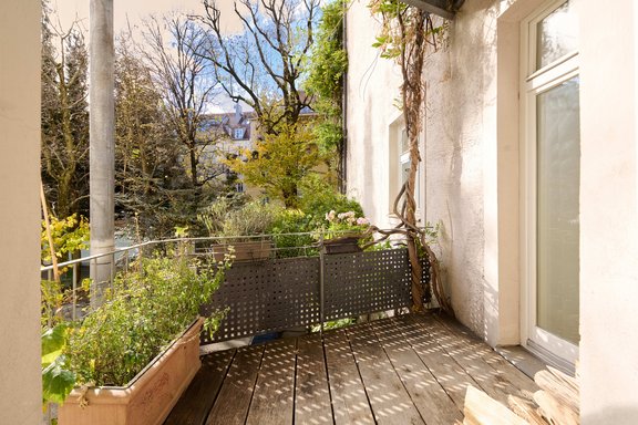 Southwest-facing balcony with garden view