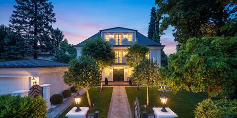 A stately villa with classic charm and a park-like garden