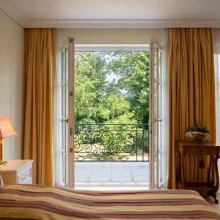 Master bedroom with access to the balcony