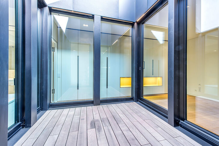 Atrium zwischen Bad, Küche, Ankleide und Schlafen