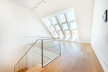 High-end apartment in prominent city location with luxury furnishings and south-facing loggia