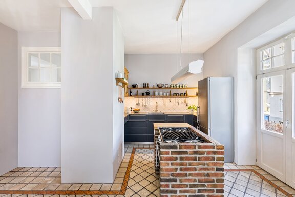 Spacious kitchen-dining room with a Mediterranean country-house feel