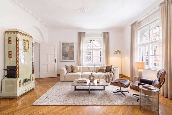 Living room with a historic tiled stove (virtually furnished)