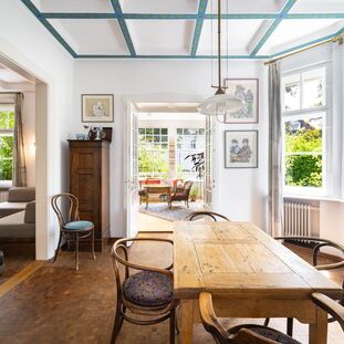 Dining room with a corner bay window