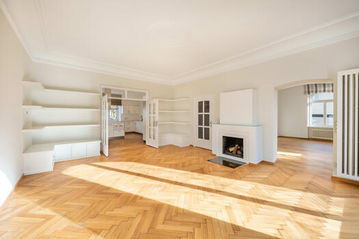 Herringbone parquet flooring and open fireplace