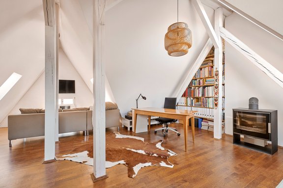 Wood-burning stove in the attic studio