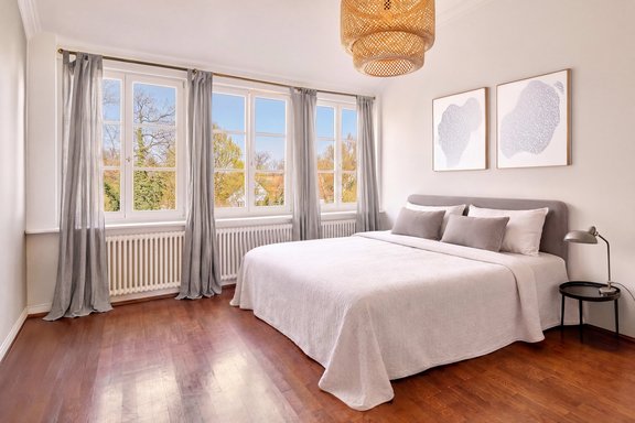 Master bedroom with a view of the garden