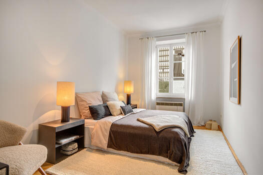 Bedroom with view into the inner courtyard
