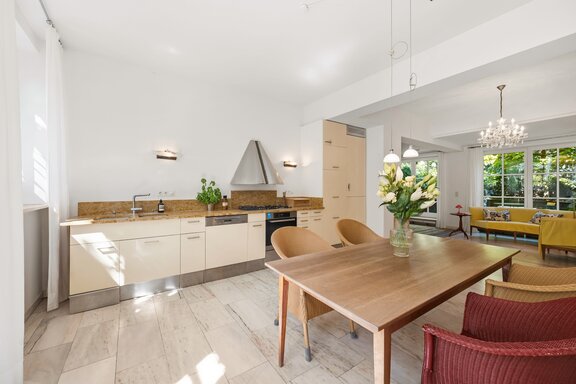 Spacious living and dining area with access to the garden