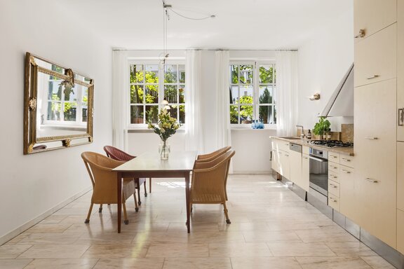 A light-filled dining area on the garden level