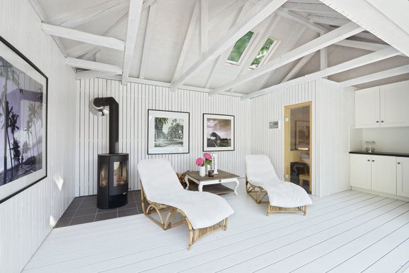 Pool house with sauna and fireplace