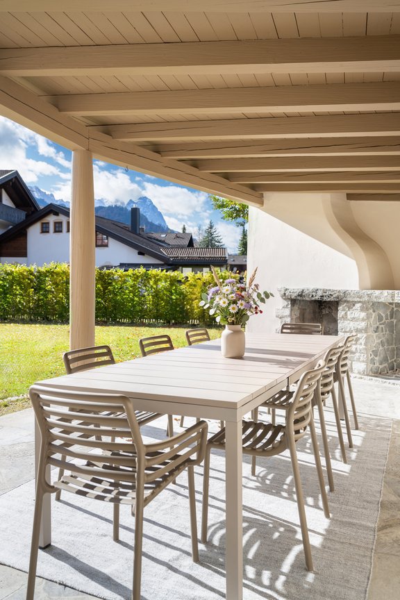 Outdoor seating in a green setting