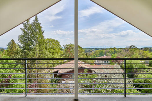 Light-filled top floor with panoramic views of the Alps