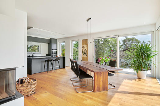 Kitchen and dining area merge harmoniously into one another