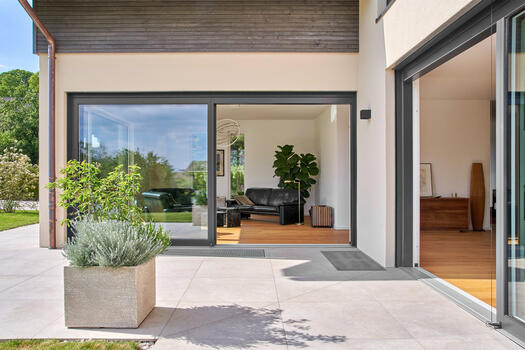 Sunny terraces extend living outside